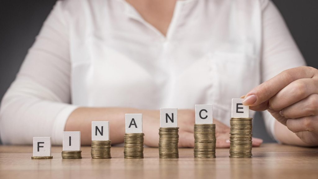 arrangement-pile-coins-with-finance-word