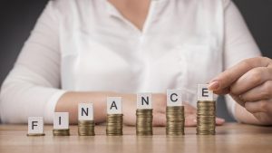 arrangement-pile-coins-with-finance-word