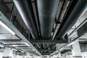 Sistema de conductos industriales para ventilación y climatización en instalación logística